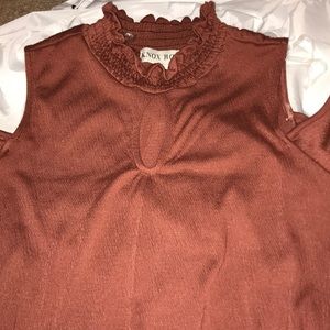 rust orange/brown shirt